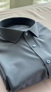 Folded black dress shirt